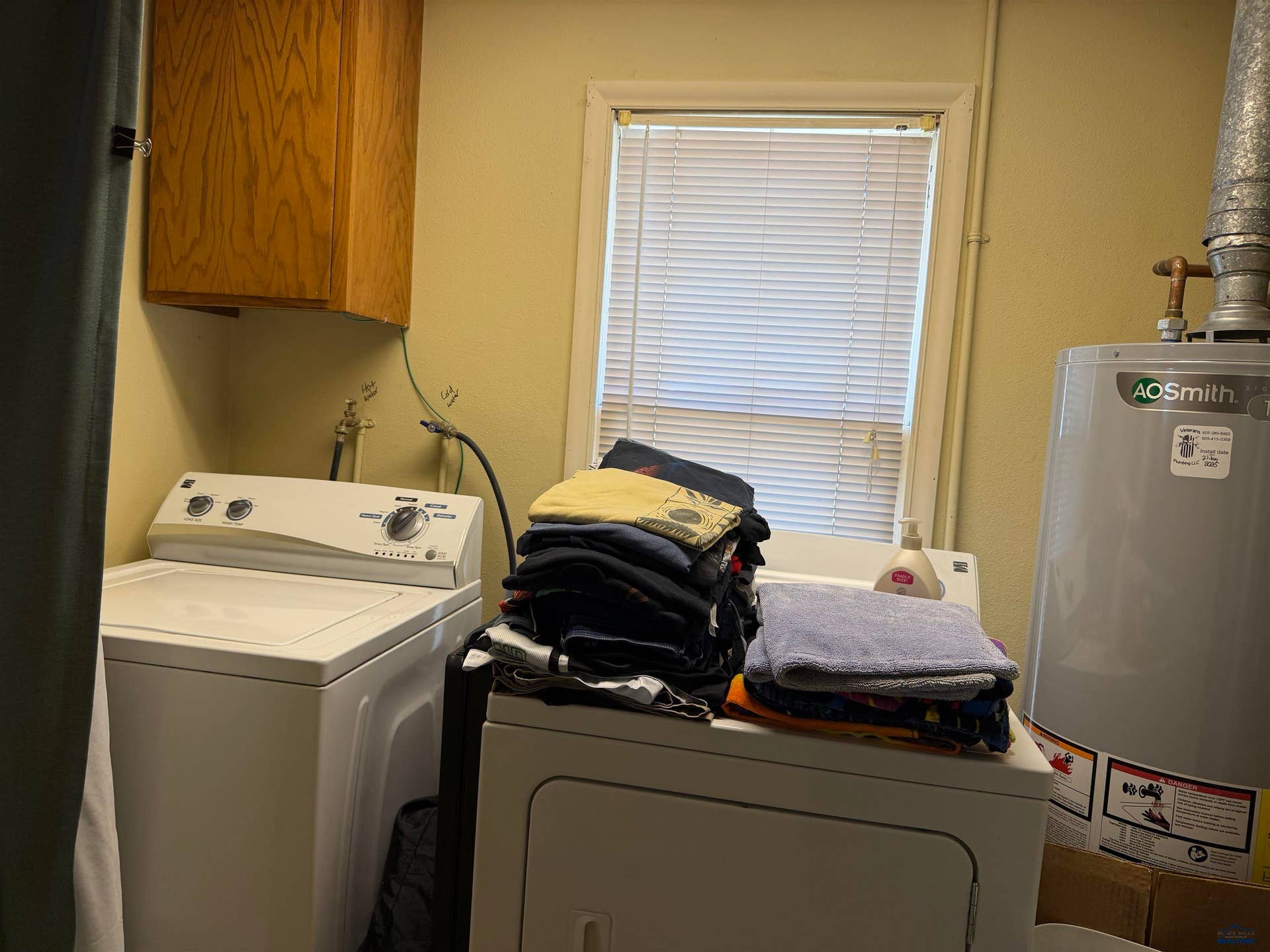 New electric water heater supplies both units