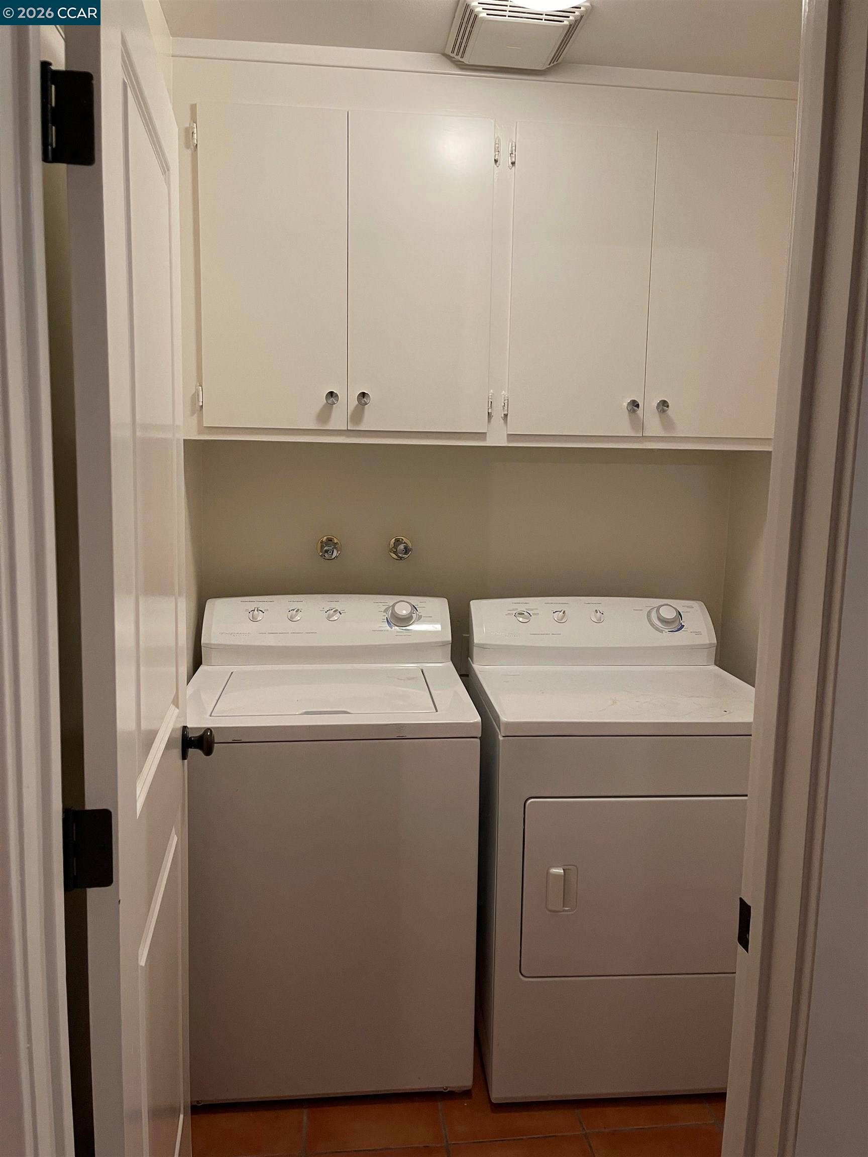 Inside Laundry w/Storage & access to Garage