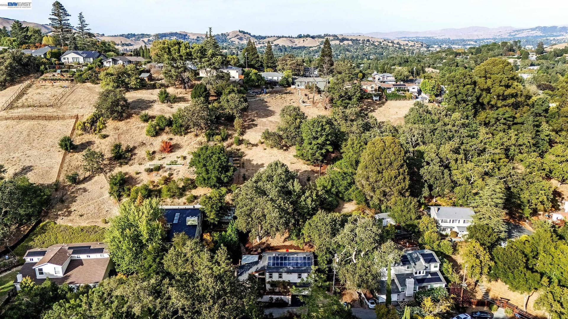 Land behind the home is fenced