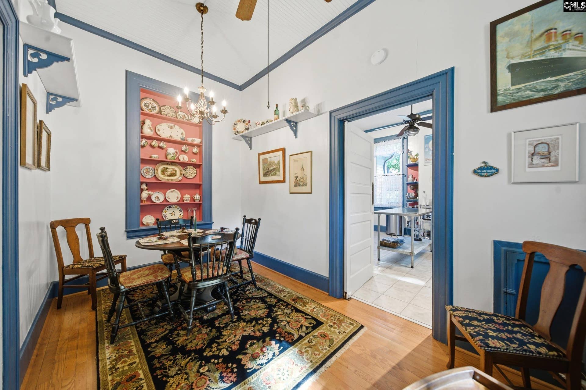 Between dining room and kitchen