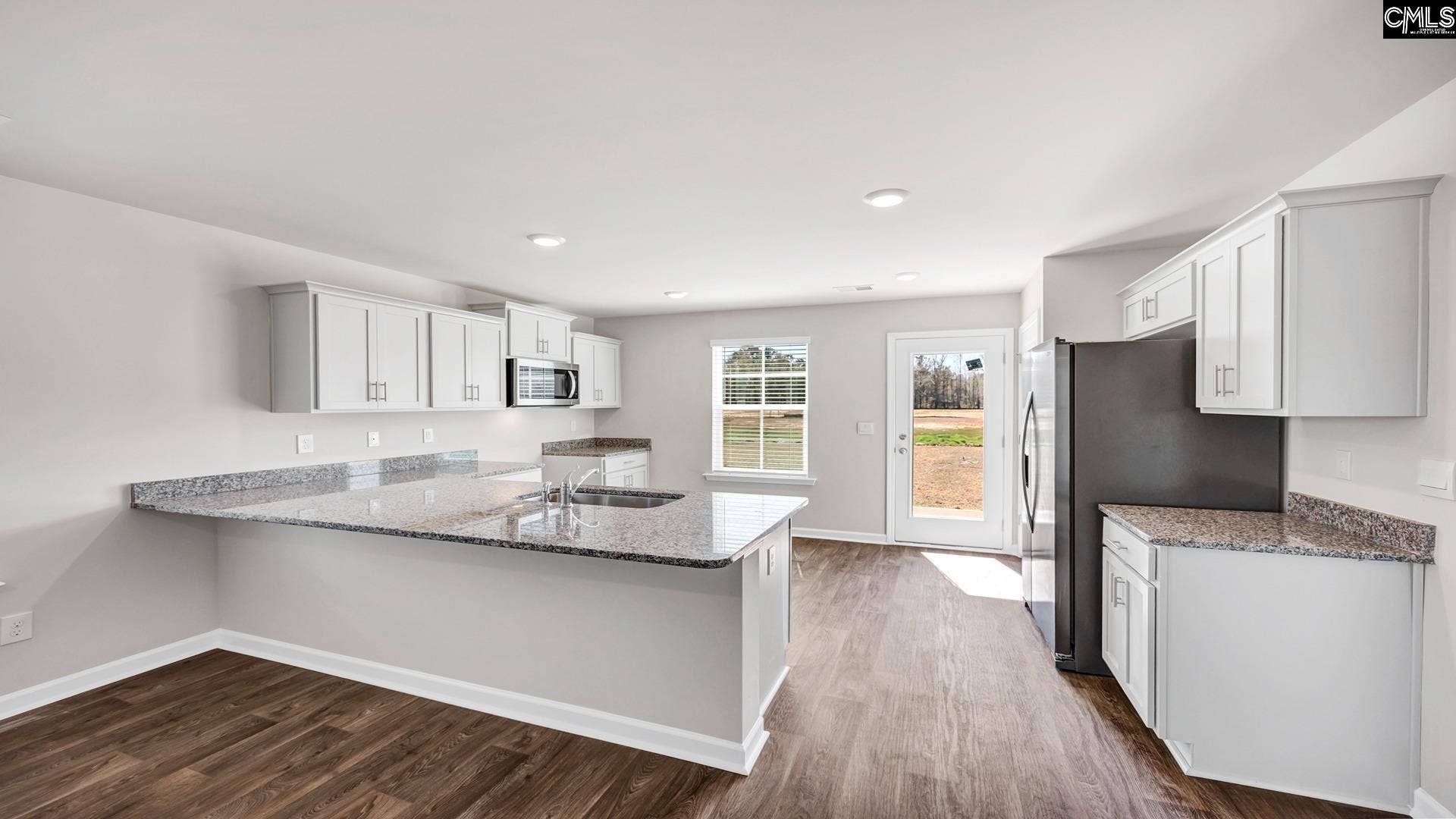 Kitchen will have quartz countertops instead of granite. And gray cabinetry instead of white.