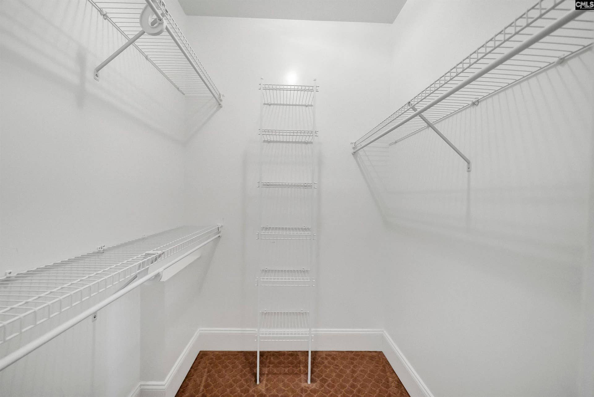 Master bedroom 1 of 2 walk in closets