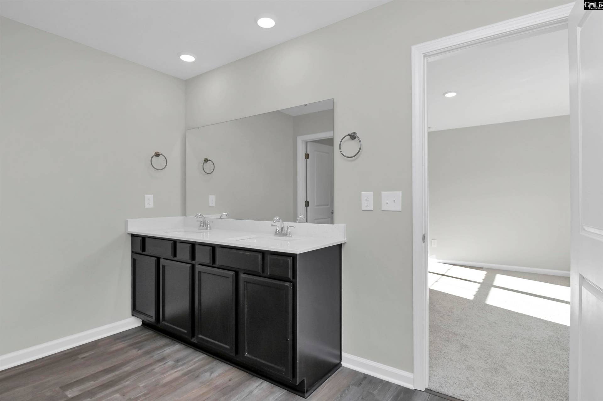 Color choice for this plan are Graphite cabinets and Empire tile, white quartz counters