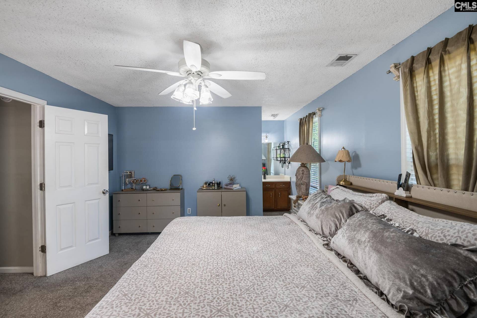 Primary suite with an open vanity area