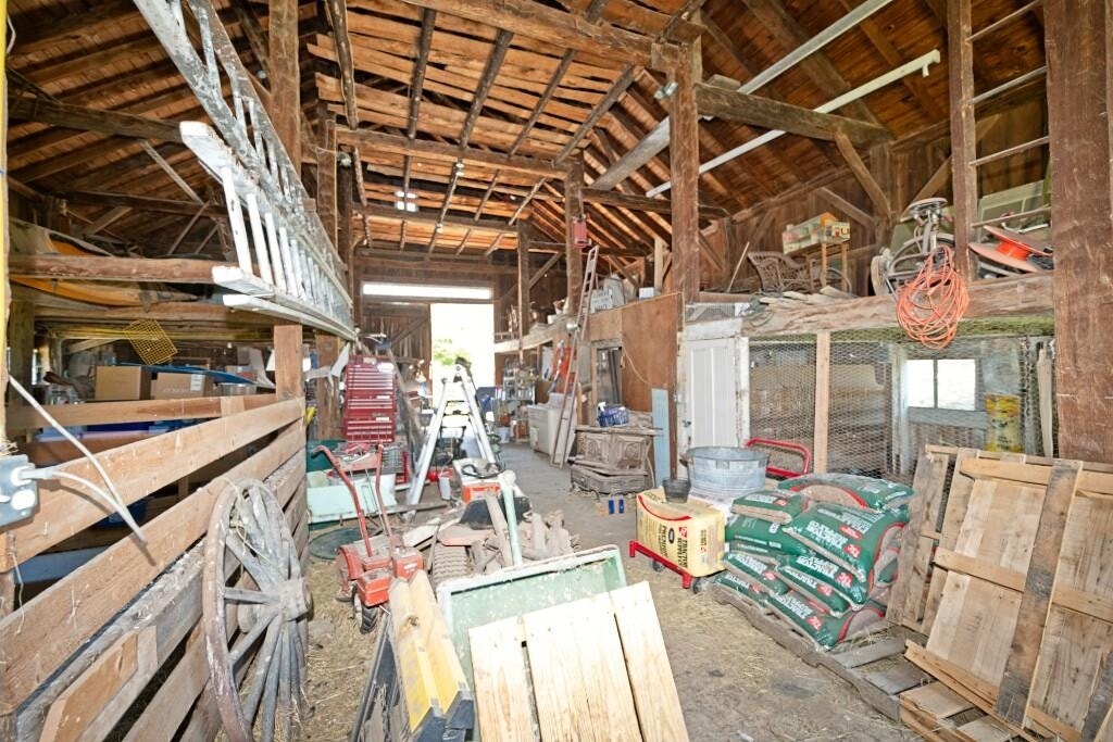 Notice the upper story surrounding the barn