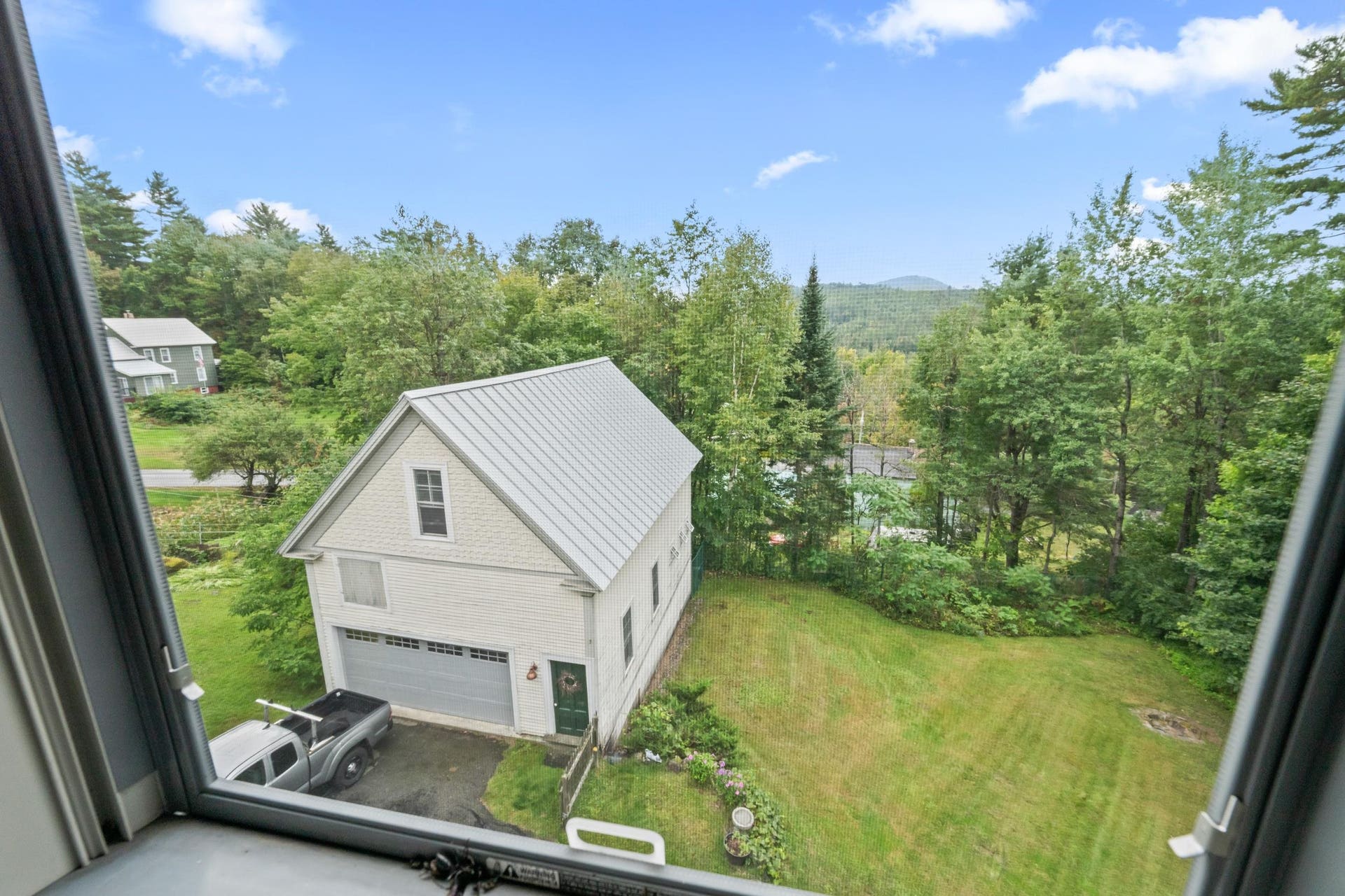 View Of Carriage House and Expansive Back Yard