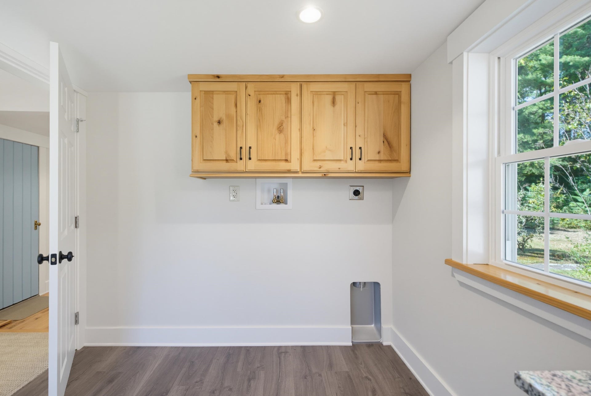 First floor 1/2 bath with laundry area