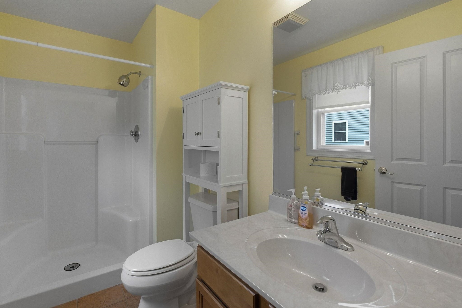 Primary bath is another 3/4 bathroom with a step in shower