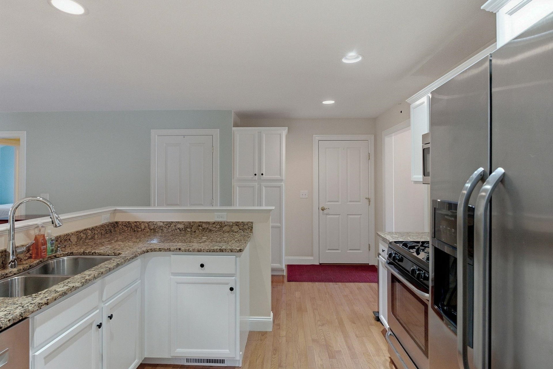 Kitchen another view showing the upgraded additional pantry closet