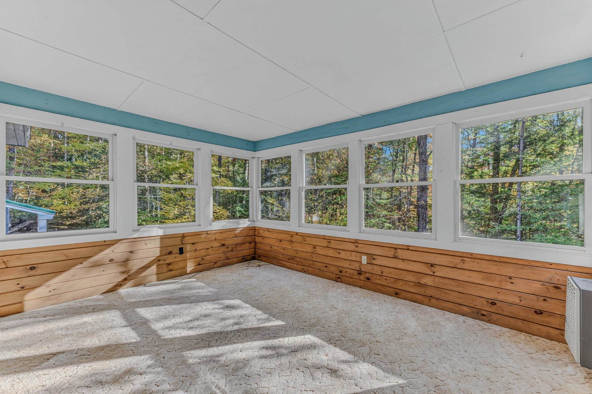 Private sunroom on the back of the home